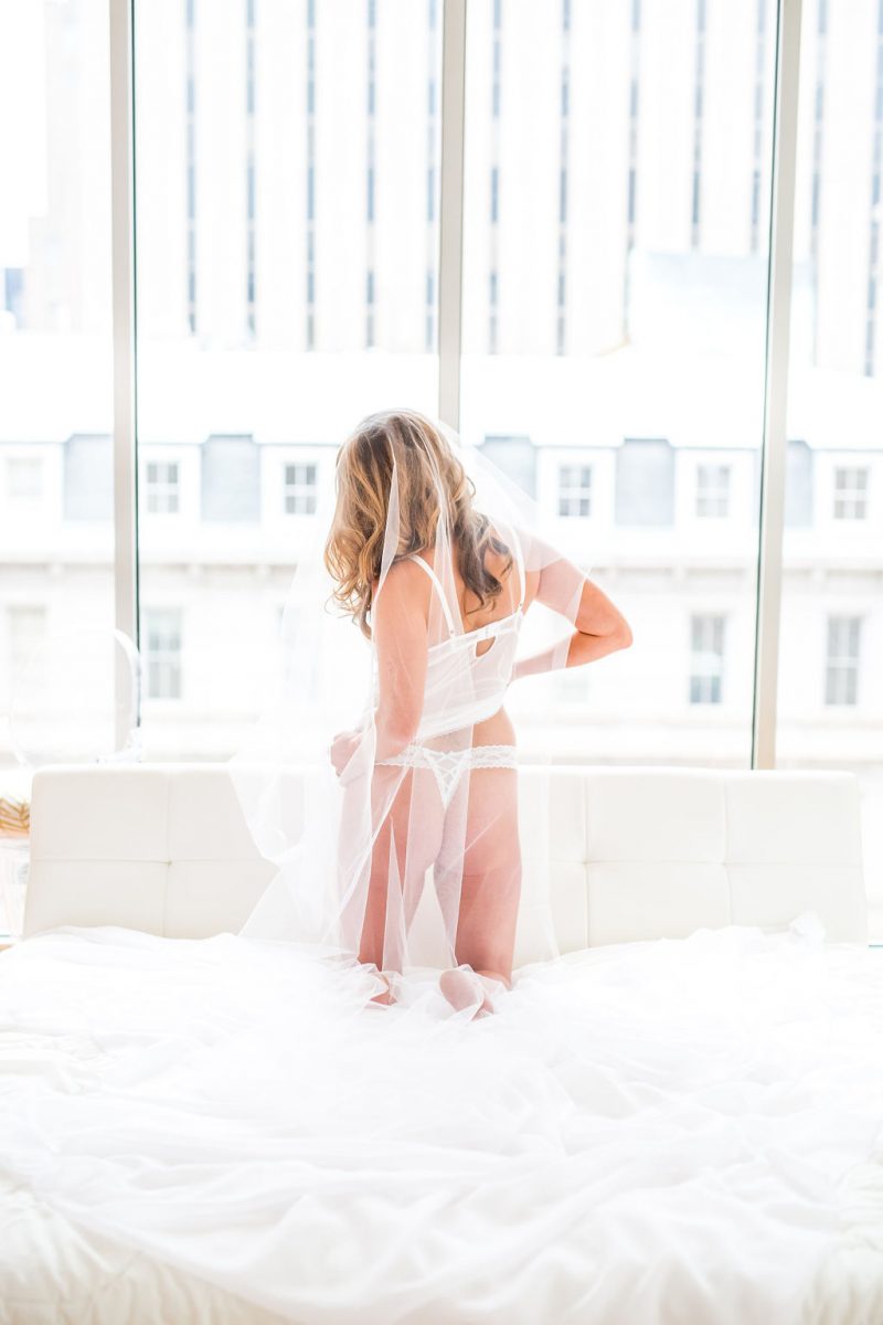 Bridal Boudoir Bridal Boudoir in white lingerie at The Glass Box downtown Raleigh by Barlow Boudoir 800x1200